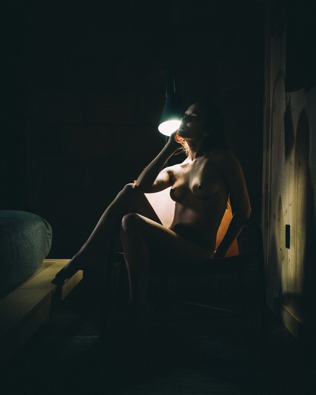 Nude art model Ayeonna poses nude for Room Noir.